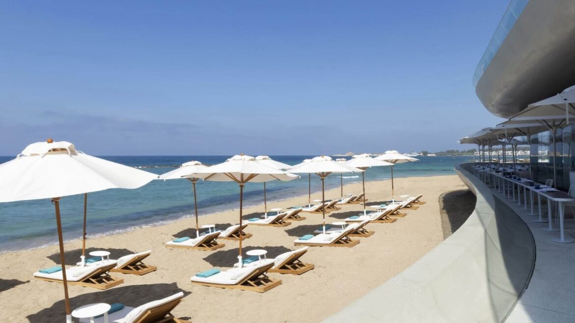 Antasia Beach Club in Paphos with sunloungers on sand