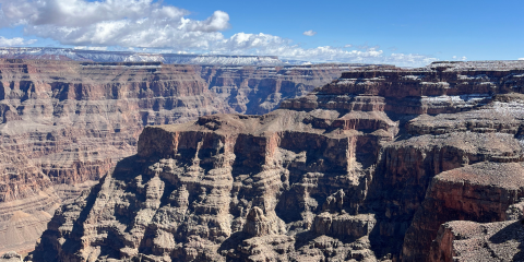 The grand canyon with snow in the backgrouund