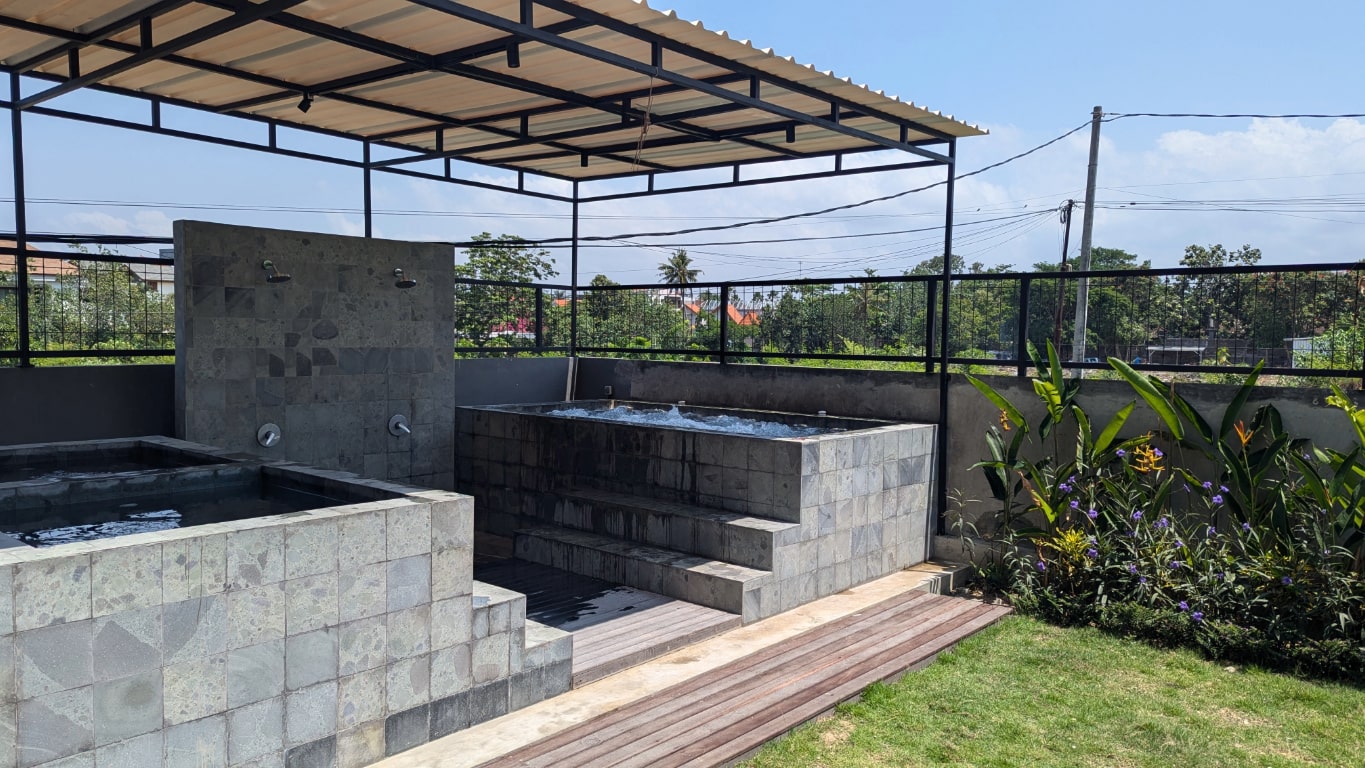 Blue skies and covered jacuzzi and cold ice bath in Canggu Bali