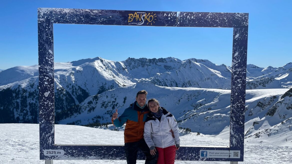 Standing in a photoframe with the snowy pirin mountains in the background